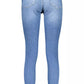 Calvin Klein Eco-Conscious Mid-Rise Skinny Jeans in Light Blue