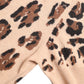 Dolce & Gabbana Elegant Beige Leopard Turtleneck Wool Top