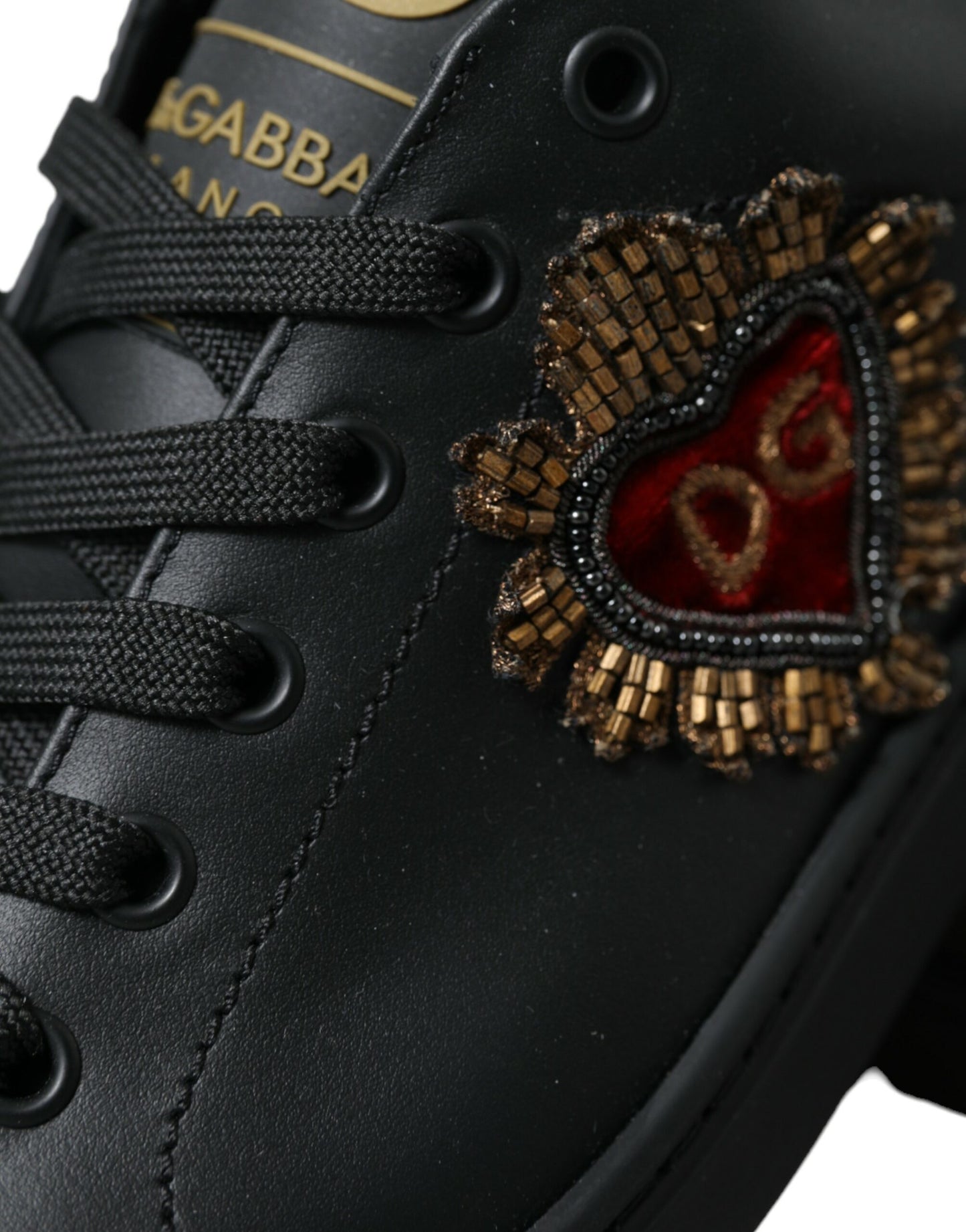 Dolce & Gabbana Elegant Black and Gold Leather Sneakers